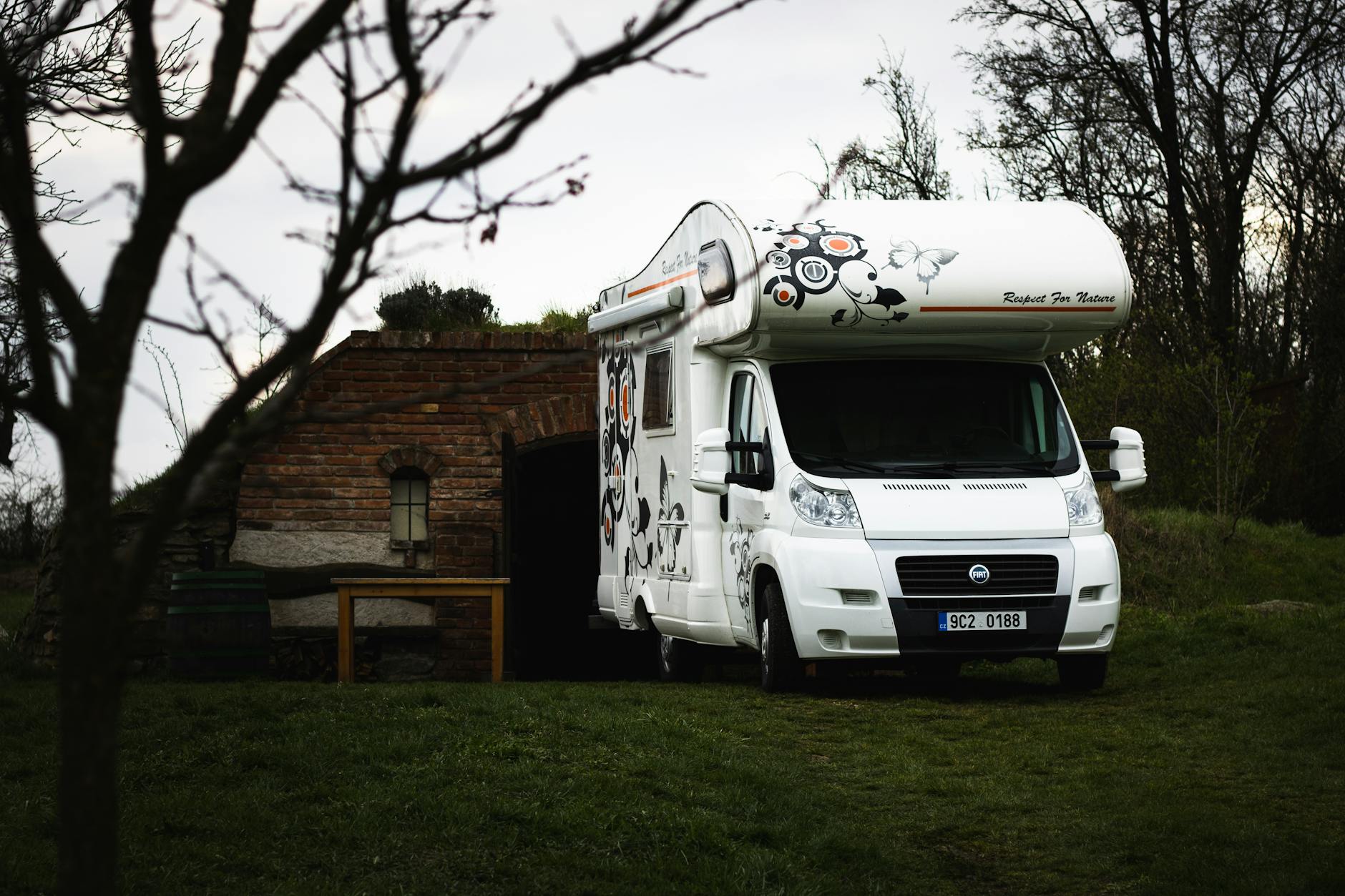 technician replacing brake pads on a Fiat Ducato motorhome